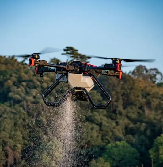XAG p100 Drone spreading product over young wheat field